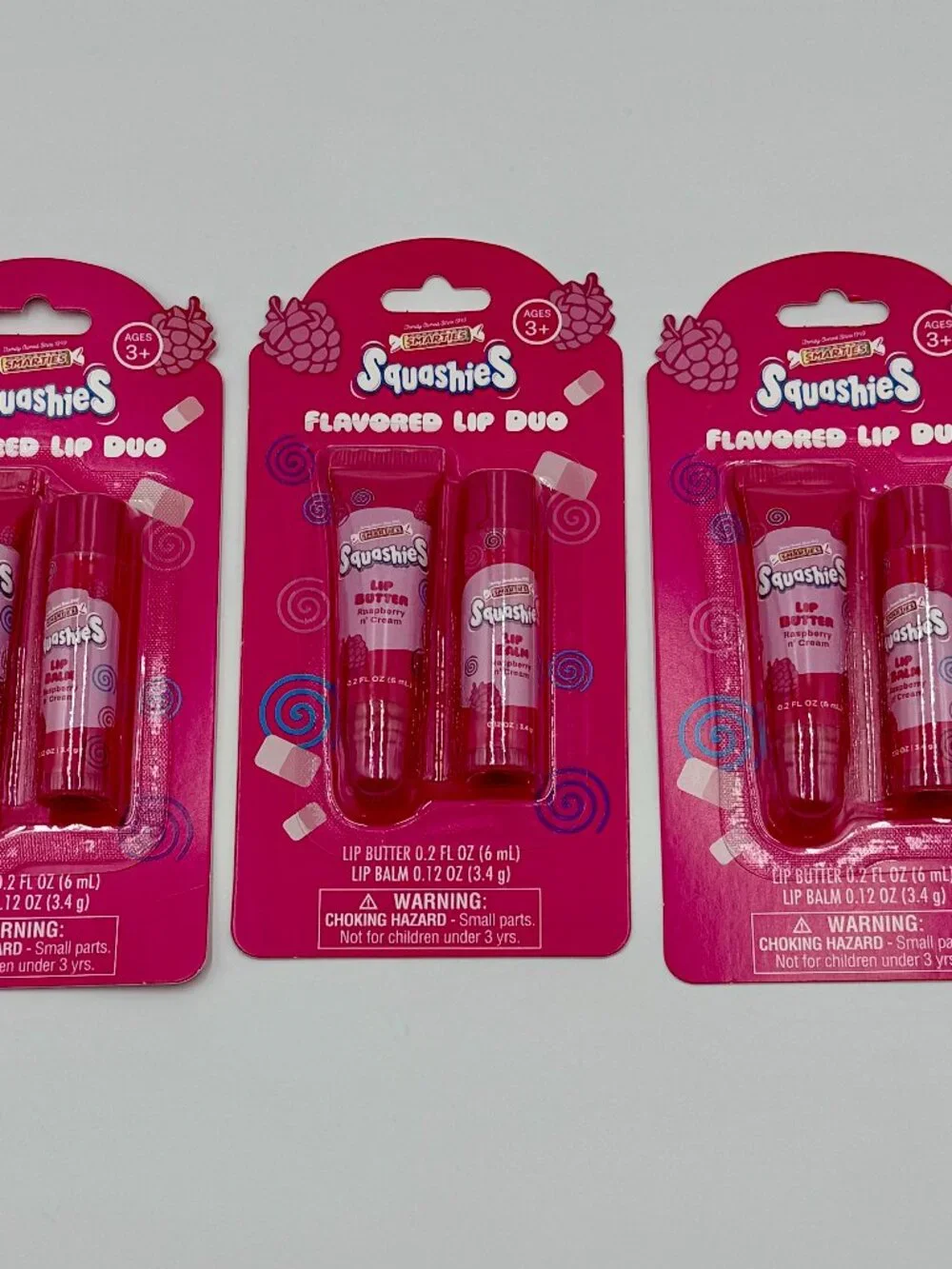 6 Smarties Raspberry N' Cream Flavored Lip Balms & Glosses